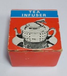 Lindo Infusor de chá em aço inox no formato de Bule.- Tea Infuser - Na caixa original sem uso - Medida da caixa: 6 cm x 6 cm x 4,5 cm.