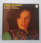 Antigo e Original Disco de Vinil de Acervo - LP - MARIA LÚCIA GODOY e a Canção Popular Brasileira e Napolitana - Ano: 1978 - Disco em ótimo estado - ACERVO do violinista, cantor e compositor Jararaca (José Luiz Calazans) e de seu filho Luiz Calazans - Medida: 31 x 31 cm.