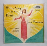 Antigo e Original Disco de Vinil de Acervo - LP - WITH A SONG IN MY HEART - as sung by JANE FROMAN - SUSAN HAYWARD - Conforme fotos - ACERVO do violinista, cantor e compositor Jararaca (José Luiz Calazans) e de seu filho Luiz Calazans -Medida: 31 x 31 cm.