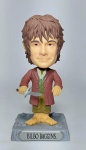 Senhor dos Anéis - Conservado Boneco Bobble Heads de Coleção - BILBO BAGGINS  - THE HOBBIT - Braços articulados - FUNKO LLC 2012 - Material: PVC - Medida: 16 cm de altura x 8 cm x 8 cm de base.