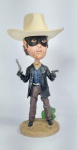 DISNEY  Lindo e conservado Boneco de coleção - THE LONE RANGER - HEAD KNOCKER -  O Cavaleiro Solitário - Fabr: NECA - National Entertainment Collectibles Association  - Resina - Medida: 22 cm de altura x 11,5 cm x 10 cm.