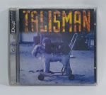 CD - Conservado e original COMPACT DISC - TALISMAN - CATS AND DOGS - CBS - Acompanha encarte. Medida: 14 cm x 12 cm x 1 cm.