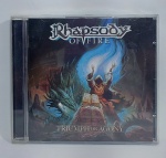 CD - Conservado e original COMPACT DISC - RHAPSODY OF FIRE - TRIUMPH OR AGONY - CBS - Acompanha encarte. Medida: 14 cm x 12 cm x 1 cm.