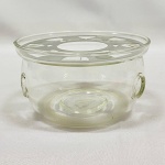 TEAVANA - Rechaud em vidro com suporte em metal. Med. 13cm de diâmtro e 7cm de altura.
