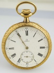 OMEGA - Relógio de bolso em ouro 18 kts, tampa toda trabalhada, com desenho de ancora, med. 5 cm de