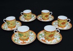<b>MAISON HERMÈS</b> - Paris. Conjunto de <b>6 xícaras para café com seus pires </b>em porcelana policromada, modelo "La Siesta".