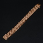 <B>Pulseira</B> em ouro 18k, com "design" tipo corda trançada. Peso 46,66 gramas.