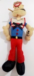 Antigo boneco Popeye confccioonado em material ensacado. Mede aproximadamente 20 cm de altura.