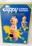 Boneca Tippy na Caixa Original com todos os acessórios. O braço precisa ser consertado como mostram as fotos.