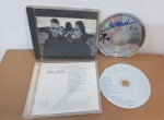 DOIS CDs: JAMES TAYLOR / U2 THEW JOSHUA THREE ** MÍDIAS EM BOM ESTADO, CAPA COM SINAIS DE USO.