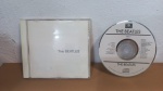 CD THE BEATLES, IMPORTADO USA. BOM ESTADO. SINAIS DE USO E TEMPO NA CAPA, MAS NADA GRITANTE