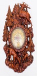 Relógio de parede italiano em material sintético. Altura  60 cm.