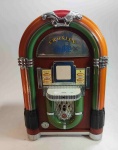 Bela Caixa de Som JUKEBOX da marca CROSLEY em caixa de madeira com plastico no frontal da maquina