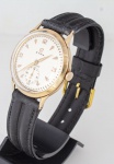Cyma - Cymaflex - Swiss - relógio de pulso masculino cerca de 1950 com caixa em ouro 18 K, mostrador branco com algarismos arábicos e pontilhados, movimento a corda com pulseira em couro preto - caixa - med. 4x3,5 cm - relógio funcionando no momento mas sem garantia futura