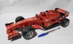 Carro Fórmula 1, produzido em plástico duro, com marcas do tempo, comprimento:37cm.