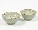 Lote composto por par de bowls em cerâmica floral final do Séc XIX, altura 4 cm e 9 cm de diâmetro.