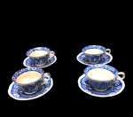 Lote composto de 4 xícaras com pires em faiança inglesa nas cores azul e branco.