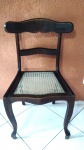 Cadeira pernambucana em madeira com estofamento em palhinha sintética.