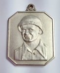 Exército Brasileiro - Medalha Sargento Max Wolff Filho - 1911/1945 - Foi um militar brasileiro. Participou da Força Expedicionária Brasileira (FEB) na frente de combate italiana durante a Segunda Guerra Mundial. Metal prateado, com detalhes em alto relevo - Medida: 4 cm x 3 cm. Em 2010, foi criada a medalha Sargento Max Wolff Filho, pelo Decreto nº 7118.6 Tal medalha é conferida a subtenentes e sargentos do Exército brasileiro, em reconhecimento à dedicação e interesse pelo aprimoramento profissional, que efetivamente se tenham destacado no seu desempenho profissional, evidenciando características e atitudes inerentes ao 2º Sargento Max Wolf Filho.