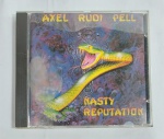 CD - Conservado e original COMPACT DISC - AXEL RUDI PELL - NASTY REPUTATION - Ano: 1991 - CBS - Acompanha encarte. Medida: 14 cm x 12 cm x 1 cm.
