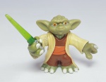 STAR WARS - Mini boneco de coleção representando - Mestre Yoda - Galactic Heroes - HASBRO 2011 - Cabeça, braços e mãos articulados - Material: PVC - Medida: 4 cm de altura sem o sabre.