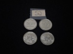Lote de 4 moedas nacionais de 200 cruzeiros em aço, datadas de 1985/1986.