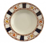 ENGLAND - Antigo prato fundo para coleção em porcelana inglesa esmaltada adornada na borda com motivo floral policromado. Possui registro da manufatura STANLEY no verso. Mede 22,5cm.