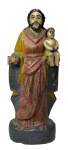 SÉC XIX - Antiga imagem sacra representando São José com menino Jesus, esculpida em madeira nobre policromada. Mede 19cm altura.