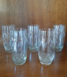 Conjunto com 05 copos longos em cristal lapidado. Med.: 15 cm de altura