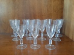 Conjunto com 12 taças de cristal, sendo: 9 taças para vinho do porto (12 cm alt.) e 3 taças para licor (11 cm de alt.)