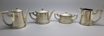 METAL - Conjunto de chá e café em metal espessurado a prata, composto de: Bules de chá e café, leiteira e açucareiro. FRANCALANZA - Med. maior 15,5 cm e menor 11 cm.