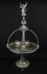 Centro de mesa ao estilo WMF em prata 90 com prato central em cristal prensado, encimado por figura angelical ( prato com rachadura, sem prato superior e perdas na estrutura do pé) -med. 77cm de altura