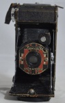 Máquina fotográfica Falcon antiga no estado