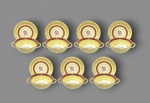 Conjunto de sete taças com pires para consome em porcelana inglesa com fina pintura floral marca "Johnson Bros" modelo PareeK (1 taça com pequeno defeito) . Med. 16 cm diam (pires) e 15 cm diam x 5,5 cm alt (taça)