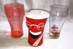 Colecionismo- Coca-Cola- Lote composto por 3 copos sendo 2 em vidro e 1 em material sintético.