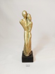 Escultura em bronze polido representando Casal sob base marmore solta assinado Mazeredo mede 25 cm base 7 cm x 7 cm