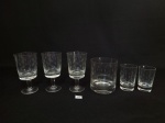 Lote reposição sendo 3 copos e 3 taças diversos modelos em cristal lapidação grao de arroz sendo copo agua e aperitivo e taças aperitivo mede taça 11 cm x 6 cm e copos 9 cm x 8 cm e 9 cm x 5 cm