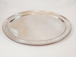 Grande travessa oval em aço inoxidavel fracalança. Medida: 56,5 cm de comprimento x 41 cm de largura x 2 cm de altura