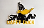 Placa decorativa metálica do "Duffy Duck". Medida 38x28cm.