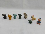 Lote de 8 miniaturas decorativas de personagens diversos. Medindo o maior 5cm de altura.