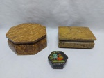 Lote de 3 caixas decorativas, sendo duas de madeira e uma em pedra. Medindo a maior 16cm x 6cm de altura.