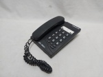 Antigo telefone fixo da marca Unicom, modelo UC-2001. com um trincado na base