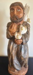 Leo 047 Alvaro Jorge - Escultura esculpida em madeira representando São Francisco de Assinada na bas