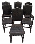 Jogo de 6 cadeiras com estrutura em madeira nobre escura torneada ao estilo clássico Manuelino rei de Portugal, assento e encosto pirografado. Marcas do tempo. No estado. Mede 47cm x 1,03m.