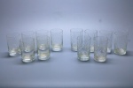 CRISTAL - Lote de 2 conjuntos com 6 copos cada em cristal, lapidados a mão. Med. 8 cm. Leves bicados. Modelos diferentes.