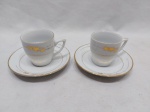 Par de xícaras de café em porcelana branca com friso ouro. Medindo a xícara 5,5cm x 5,5cm de altura.