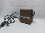 (99) Antigo projetor Minolta Blower Mini 35, década de 60, funcionando perfeitamente.OK