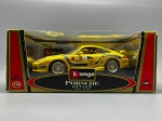 COLECIONISMO - Burago Porsche 911 Carrera - GT3 - CUP, na cor amarela . - Escala 1:18 - Na caixa.