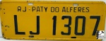 COLECIONISMO - Placa automotiva em ferro, esmaltada em tom amarelo - LJ 1307. Med. 16x40 cm.