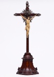 Crucifixo  em marfim com aplicações em prata, séc. XIX. Faltando dedos da mão direito. Altura da cruz 69 cm e altura do cristo 20 cm.